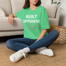Load image into Gallery viewer, Built Different T-Shirt — “Built Different Growth Looks Good On Me Tee”
